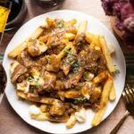 Lamb curry poutine